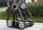 Novel design of reconfigurable tracked robot with geometry-changing tracks